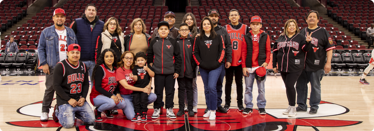 a group of fans taking a center court photo